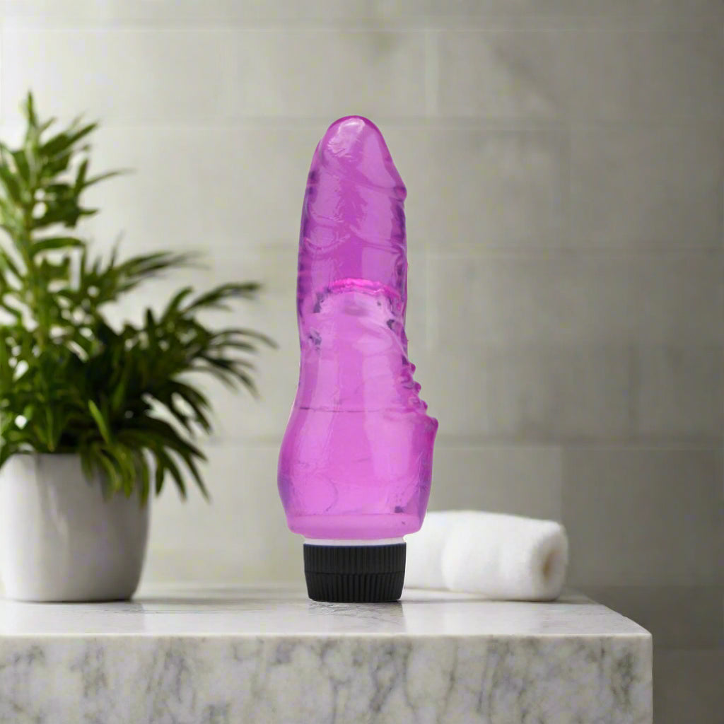 Purple vibrator on a white background