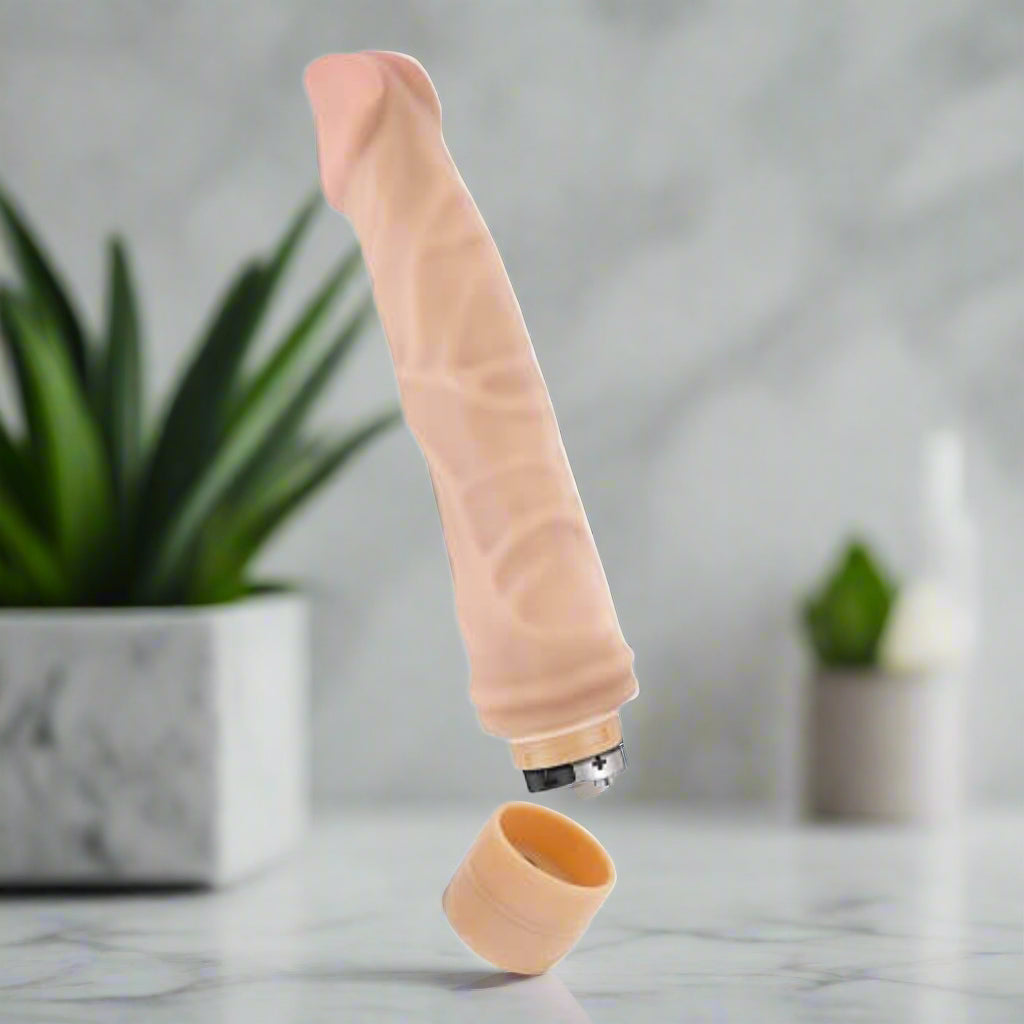 Beige vibrator on a white background