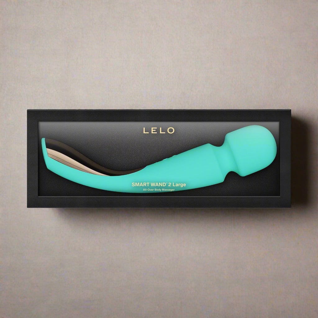 Turquoise LELO smart wand in packaging on a white background