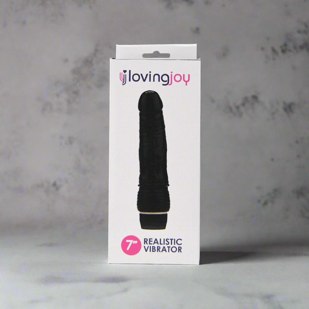 Black realistic vibrator in packaging with 'loving joy' branding on a white background