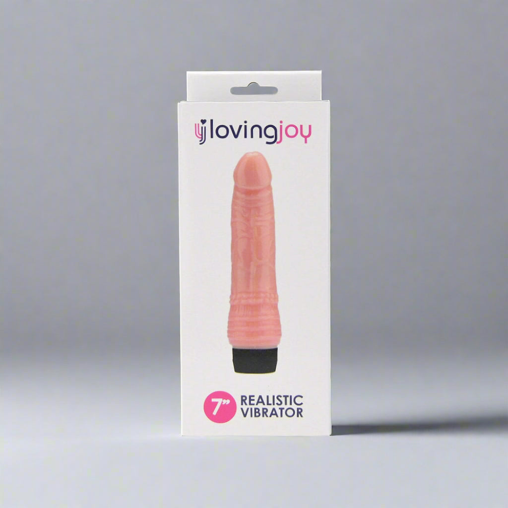 Pink vibrator in a white box with 'loving joy' branding on a white background