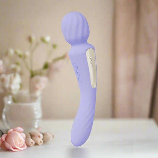 Purple wand vibrator on a white background